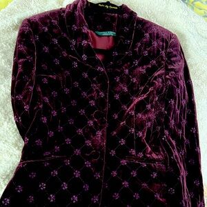 Burgundy color velvet jacket.